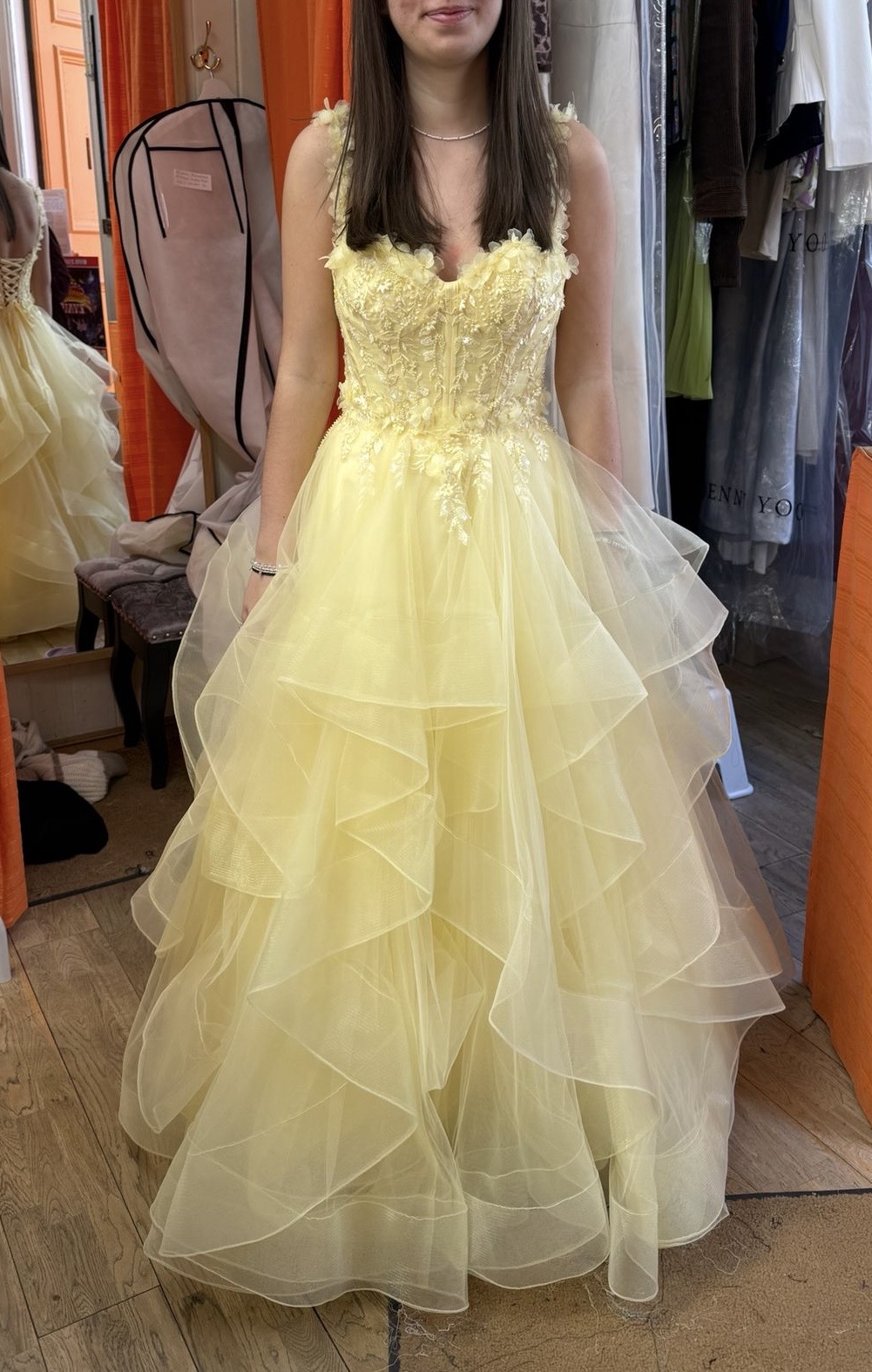 Yellow ruffled prom gown, front view